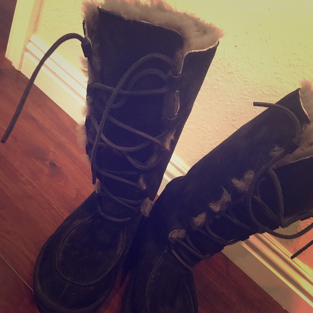 Women’s UGG tall lace up boots. Size 7.